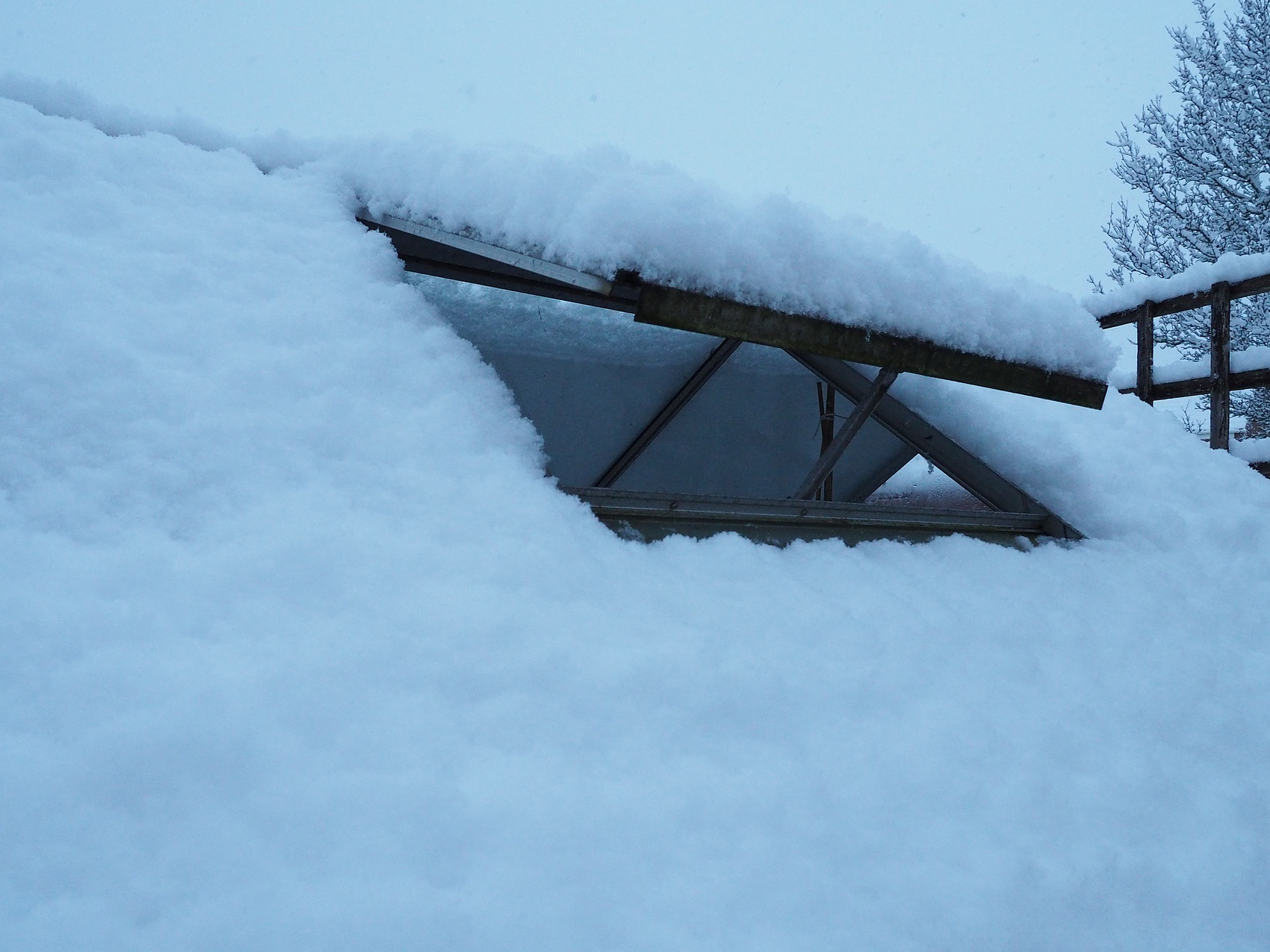 How to Properly Use a Roof Rake to Remove Thick Snow