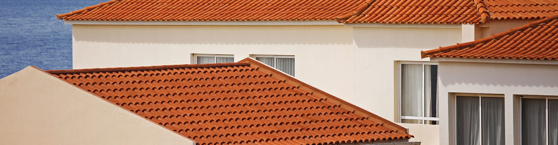 Fragments of several houses with tiled roof